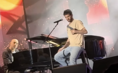 Singer-songwriter Idan Raichel on piano with released hostage Sagui Dekel-Chen on April 29. 2025 (Screengrab: YouTube)